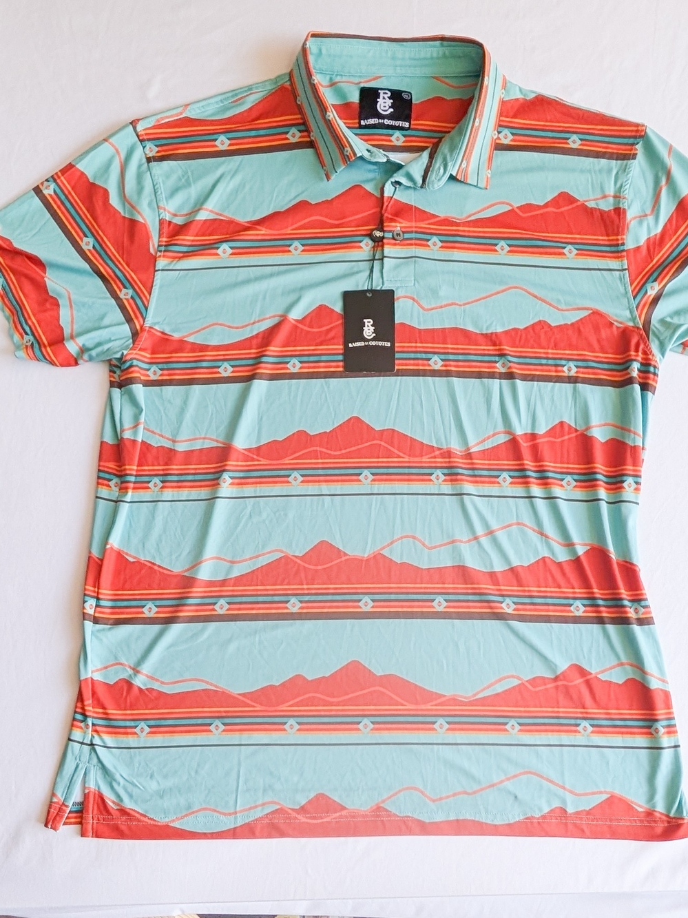 Raised By Coyotes Polo Shirt Mens XL Blue Southwestern Golf Performance Stretch